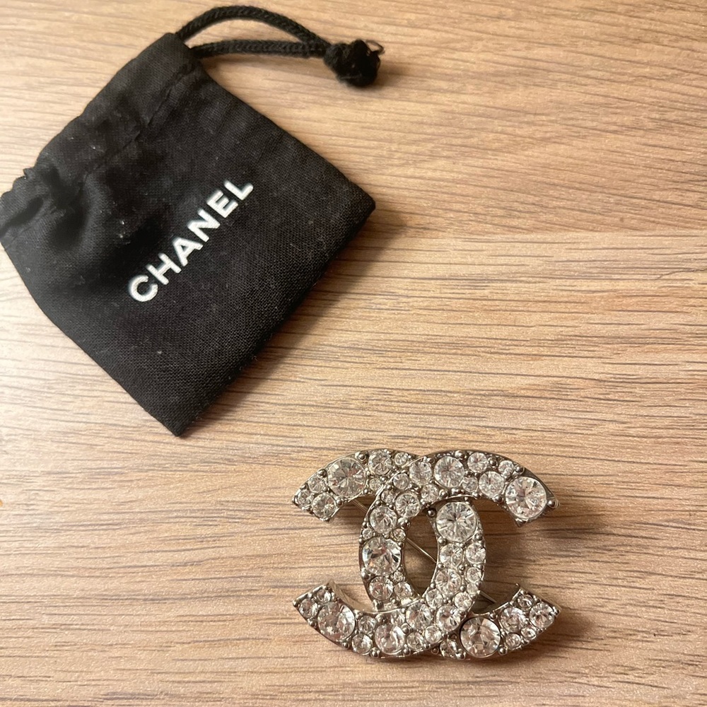 This Chanel crystal logo brooch can change the whole look!